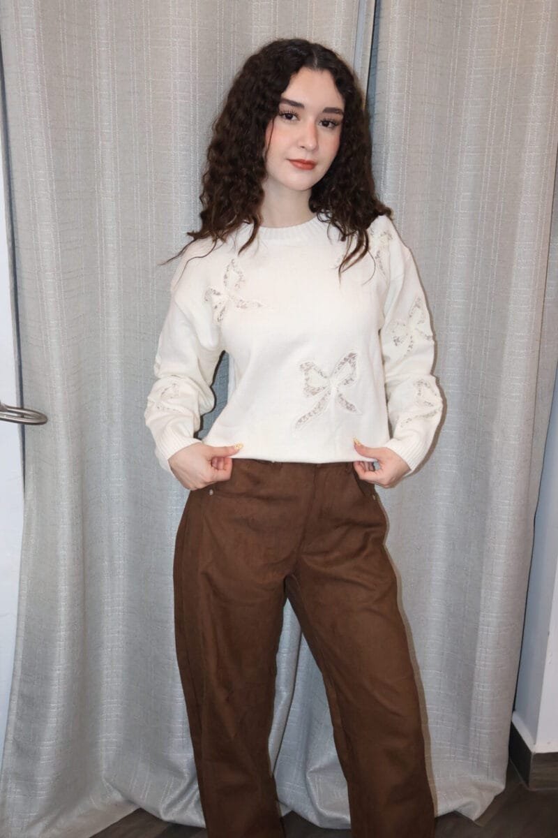 Sueter beige con moños