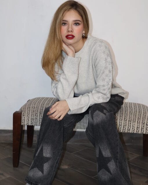 Jeans negros con estampado de estrellas